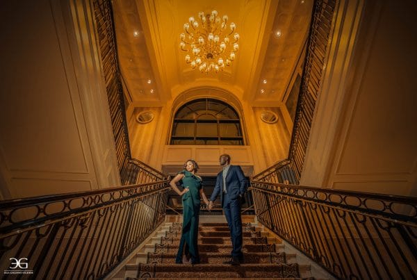 Couple photoshoot in beautiful stairs holding hands
