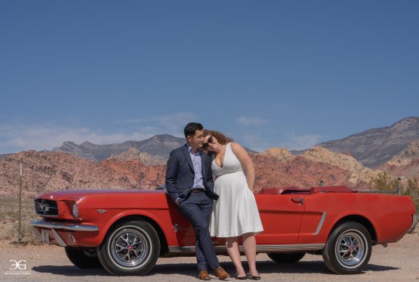 desert engagement photoshoot with red ford mustang