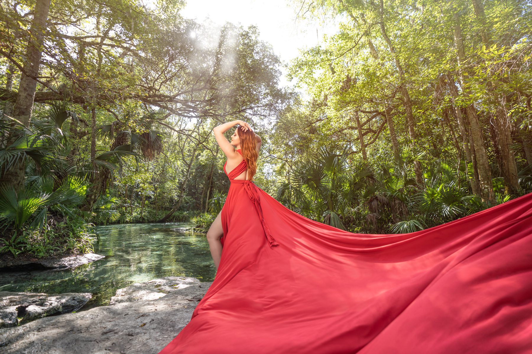 Women Empowerment Photoshoot at Rock Springs Florida in Red Flowy Dress