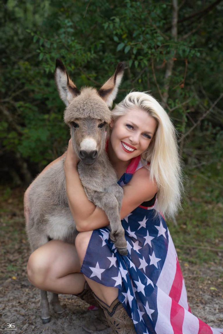 Kentucky equine photographer Ella Gagiano sharing a quiet moment with a donkey on her farm