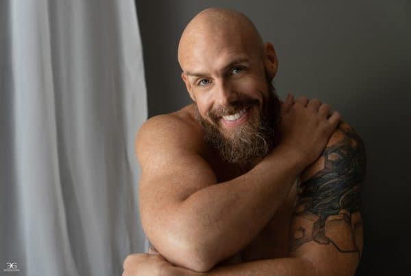 Smiling man during a professional men's portrait photography session