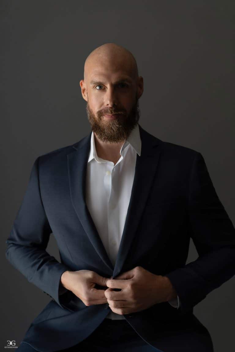 Men's portrait photography in Lexington KY featuring a man in a navy suit