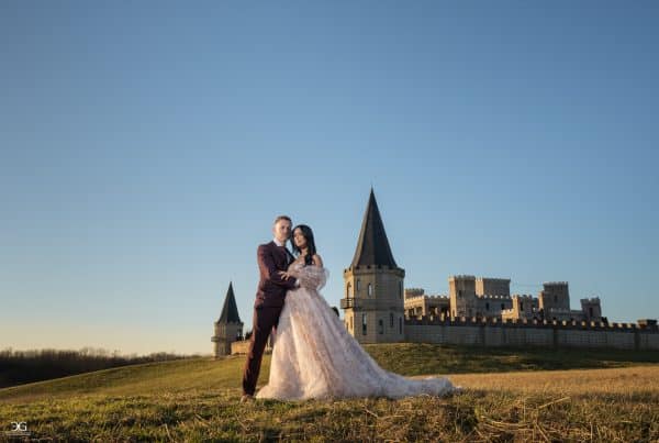 Couple photographed outside The Kentucky Castle for Kentucky Castle wedding photography